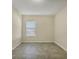 Bright bedroom with tile floors and a window at 2824 47Th E St, Palmetto, FL 34221