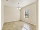 Simple dining room with tile flooring and a chandelier at 2824 47Th E St, Palmetto, FL 34221