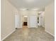 Spacious hallway with tile flooring and access to multiple rooms at 2824 47Th E St, Palmetto, FL 34221