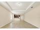 Open living room and kitchen with tile flooring at 2824 47Th E St, Palmetto, FL 34221