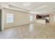Open living room and kitchen with tile flooring at 2824 47Th E St, Palmetto, FL 34221