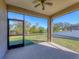 Relaxing screened porch overlooking a pond and backyard at 2824 47Th E St, Palmetto, FL 34221