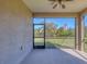 Screened porch with pond view and ceiling fan at 2824 47Th E St, Palmetto, FL 34221