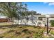 Private backyard with a large grassy area at 2925 29Th W Ave, Bradenton, FL 34205