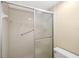 Clean bathroom with shower stall and neutral tile at 2925 29Th W Ave, Bradenton, FL 34205