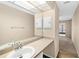Bathroom boasting a vanity with a single sink and mirror at 2925 29Th W Ave, Bradenton, FL 34205