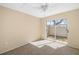 Bedroom with carpet flooring and sliding glass doors leading to a private patio at 2925 29Th W Ave, Bradenton, FL 34205