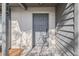 Gray front door with a raised panel design at 2925 29Th W Ave, Bradenton, FL 34205