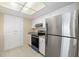 Clean kitchen featuring stainless steel appliances and white cabinets at 2925 29Th W Ave, Bradenton, FL 34205