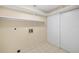 Laundry room with built-in shelving and space for a washer and dryer at 2925 29Th W Ave, Bradenton, FL 34205