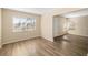 Living room with light walls and wood-look floors at 2925 29Th W Ave, Bradenton, FL 34205