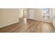 Living room with light walls and wood-look floors at 2925 29Th W Ave, Bradenton, FL 34205