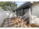 Private patio area with wood chips and a small garden at 2925 29Th W Ave, Bradenton, FL 34205