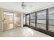 Sunroom with tile flooring and plenty of natural light at 2925 29Th W Ave, Bradenton, FL 34205