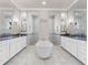 Spa-like Primary bathroom with double vanities, soaking tub, and walk-in showers at 3407 155Th E Ave, Parrish, FL 34219
