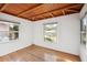 Bright bedroom with hardwood floors and wood ceiling at 349 Scott Ave, Sarasota, FL 34243