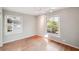 Bright bedroom with hardwood floors and large windows at 349 Scott Ave, Sarasota, FL 34243