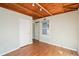 Charming bedroom with wood ceiling and hardwood floors at 349 Scott Ave, Sarasota, FL 34243