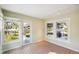 Versatile room with tile floors, exterior access, and natural light at 349 Scott Ave, Sarasota, FL 34243