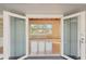 View through double doors into living area at 349 Scott Ave, Sarasota, FL 34243