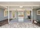 Covered front patio with double doors at 349 Scott Ave, Sarasota, FL 34243