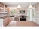 Modern kitchen with stainless steel appliances and island at 349 Scott Ave, Sarasota, FL 34243