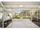 Spacious screened patio with flagstone flooring at 349 Scott Ave, Sarasota, FL 34243