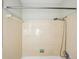 Clean shower with light-colored tile and showerhead at 349 Scott Ave, Sarasota, FL 34243