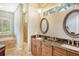 Elegant bathroom with double vanity, soaking tub, and walk-in shower at 3861 Royal Hammock Blvd, Sarasota, FL 34240