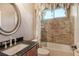 Small bathroom with shower/tub combo and granite vanity at 3861 Royal Hammock Blvd, Sarasota, FL 34240