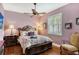 Guest bedroom with a queen-size bed and hardwood floors at 3861 Royal Hammock Blvd, Sarasota, FL 34240