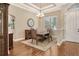 Formal dining room with hardwood floors and a chandelier at 3861 Royal Hammock Blvd, Sarasota, FL 34240