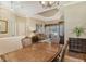 Bright dining room with a view into the living room and kitchen at 3861 Royal Hammock Blvd, Sarasota, FL 34240