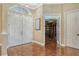 Bright entryway with double doors and hardwood floors at 3861 Royal Hammock Blvd, Sarasota, FL 34240