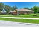 Single-story home with attached garage and manicured lawn at 3861 Royal Hammock Blvd, Sarasota, FL 34240