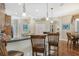 Updated kitchen featuring granite countertops and hardwood floors at 3861 Royal Hammock Blvd, Sarasota, FL 34240