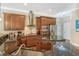 Gourmet kitchen with granite counters and stainless steel appliances at 3861 Royal Hammock Blvd, Sarasota, FL 34240
