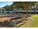 Playground with picnic table and play structures at 3861 Royal Hammock Blvd, Sarasota, FL 34240