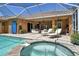Relaxing pool and spa area with screened enclosure at 3861 Royal Hammock Blvd, Sarasota, FL 34240
