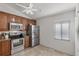 Kitchen with stainless steel appliances and wood cabinets at 3911 Penrod Ln, Valrico, FL 33596