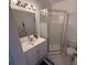 Clean bathroom, shower, toilet and vanity with mirror at 417 Avenida De Mayo, Sarasota, FL 34242