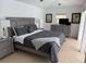 Main bedroom with king-size bed and dresser at 417 Avenida De Mayo, Sarasota, FL 34242
