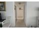 Clean and bright hallway with mirrored closet doors at 417 Avenida De Mayo, Sarasota, FL 34242