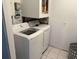 Stackable LG washer and dryer in the laundry room at 417 Avenida De Mayo, Sarasota, FL 34242