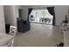 Living room with view to the pool and patio area at 417 Avenida De Mayo, Sarasota, FL 34242