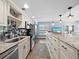 Updated kitchen with stainless steel appliances and granite countertops at 4215 Gulf Of Mexico Dr # 103, Longboat Key, FL 34228