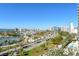 Stunning aerial view of cityscape, waterfront, and bridge at 435 S Gulfstream Ave # 1004, Sarasota, FL 34236