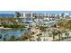 Aerial view of waterfront community with yachts and high-rise buildings at 435 S Gulfstream Ave # 1004, Sarasota, FL 34236