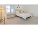 Bright bedroom featuring a queen-size bed and city views at 435 S Gulfstream Ave # 1004, Sarasota, FL 34236