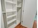 Spacious closet with ample shelving and hanging space at 435 S Gulfstream Ave # 1004, Sarasota, FL 34236